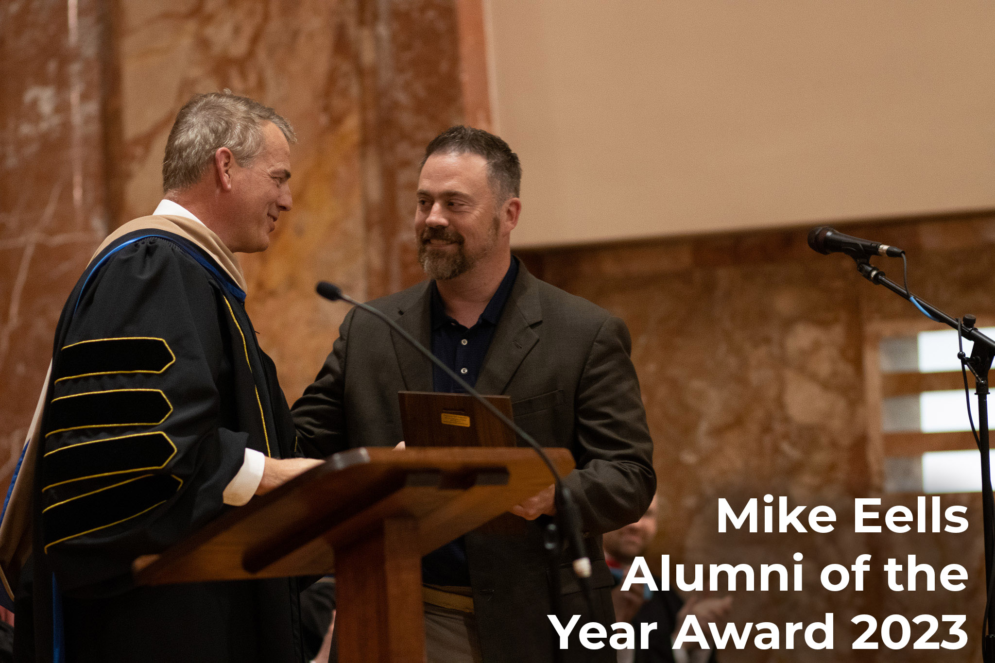 Man receiving an award