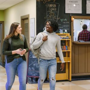 Emmaus students walking through coffee shop