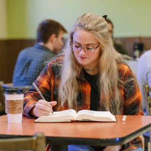 Emmaus student studying her Bible