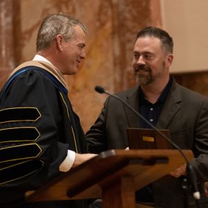 Man receiving an award