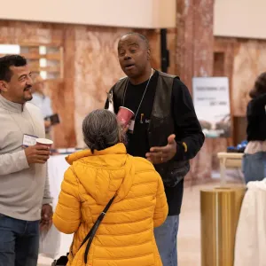 Conference attends enjoying a coffee break