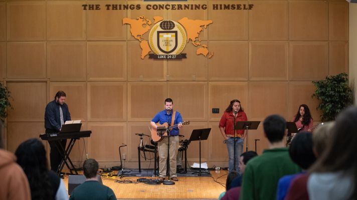 Emmaus band playing during chapel