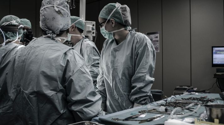 Healthcare workers in an operating room